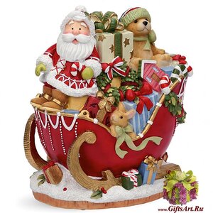 Дед мороз с медвежонком и кроликом развозят на санях подарки. Музыкальная фигурка. Подарок на новый год. Высота 18 см